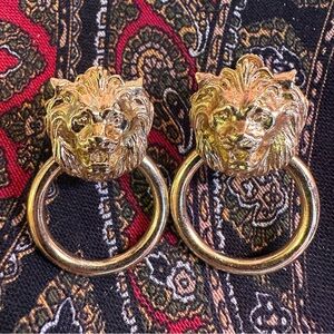 Lion clip on earrings.
